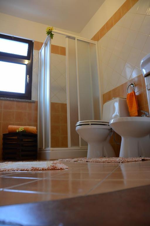 ريبوسْتو B&B Casabella الغرفة الصورة